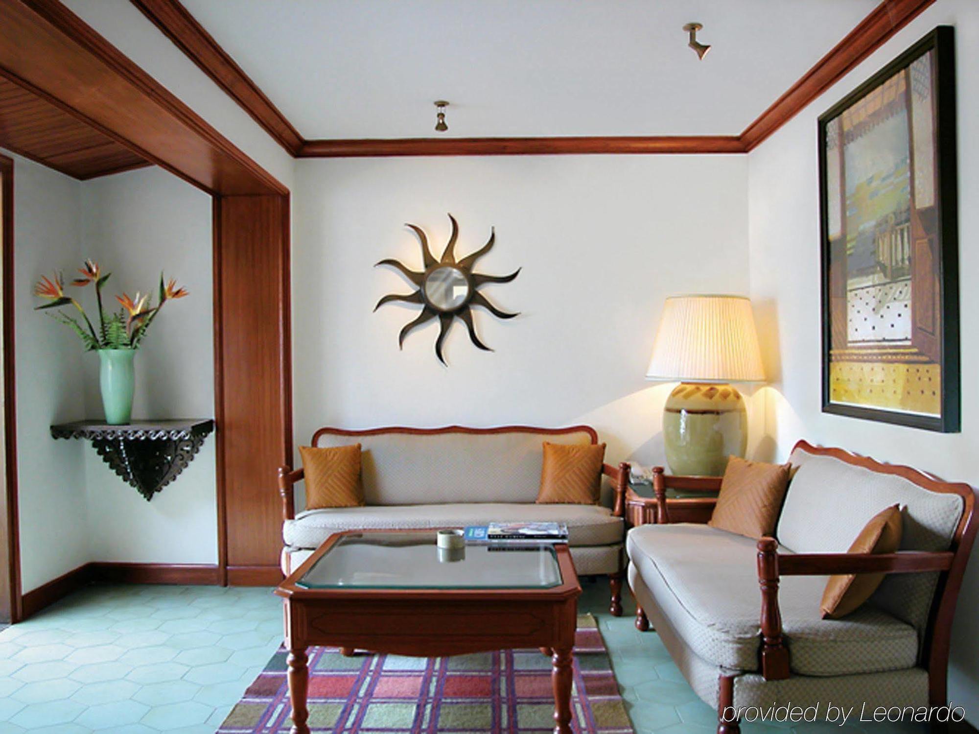 果阿泰姬堡阿瓜达度假酒店 Sinquerim 客房 照片 A living room